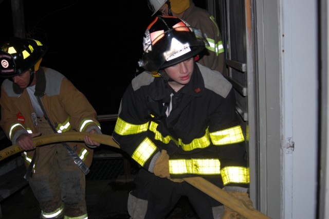 Training at Weekapaug Inn 1/09/08

Probationary FF John Burnap (rear) and Jr. FF Keegan Main help advance the line